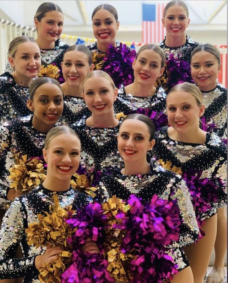 The team in their sparkling poms costumes. 
