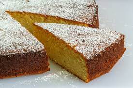 Photo courtesy of Wikimedia Commons. Olive oil cake topped with powdered sugar. 