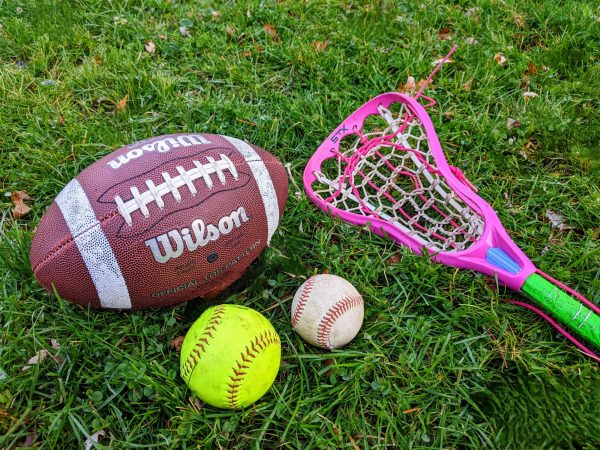 Football, Baseball, Softball, and Lacrosse Stick - Equipment of 4 of the 6 added sports