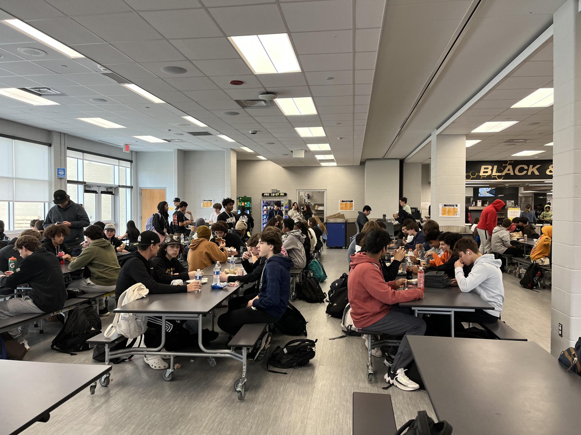Hinsdale South Students Conversing During Their Lunch Period