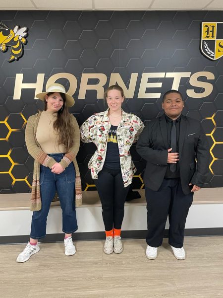 The poems authors are senior Rebecca Williams (from left), senior Faith Conard, and junior Zion Ellison. Not pictured is senior Wendy Pacheco.