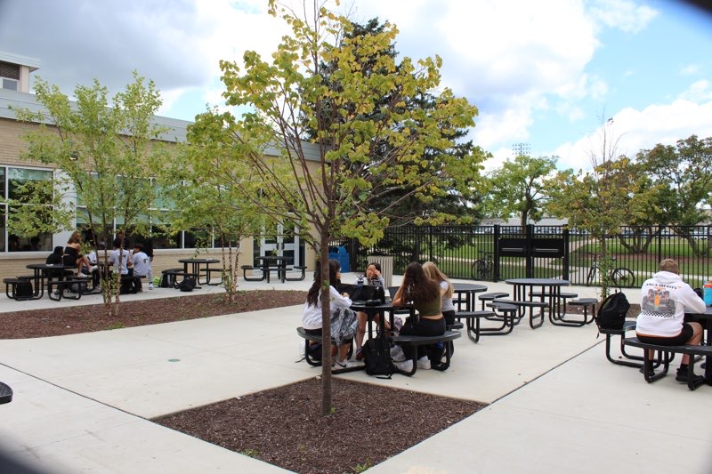 Students eat in the cafeteria during their lunch period.