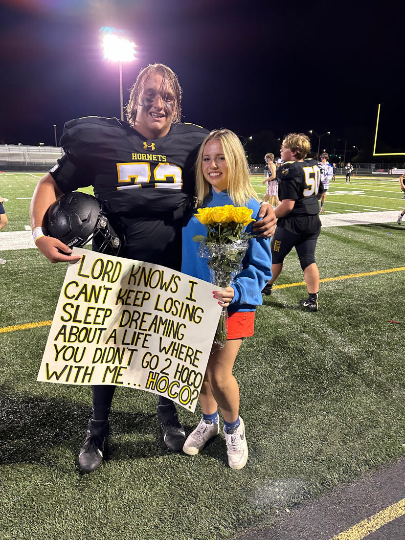 Ryder McMurray asks Lillian Davy to Homecoming at a home football game.