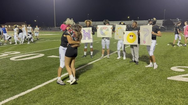 Nick Okrim asks Bella Cortez to Homecoming during a home football game.