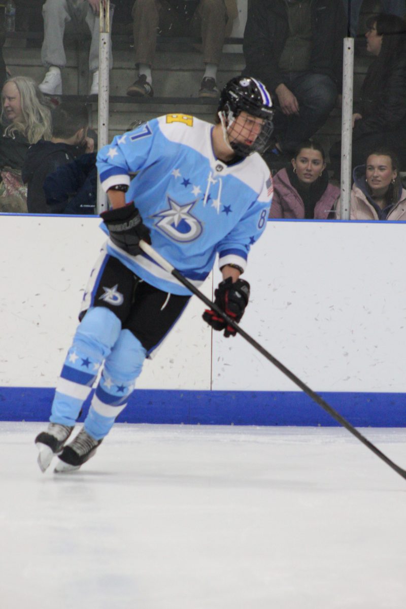 Hinsdale South senior Matas Norukus, as he brings to puck towards the Spartans goal.